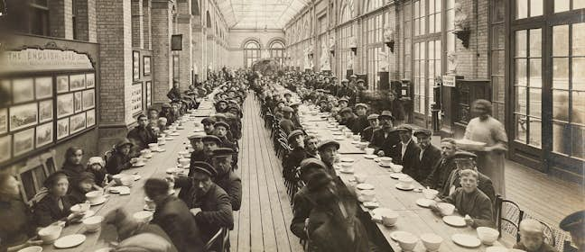 Refugees dining in the Great Hall during WWI