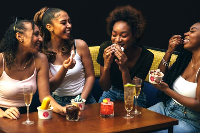 Women eating ice dessert at TOCA Social