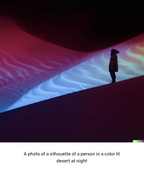 a person in a colourful desert at night