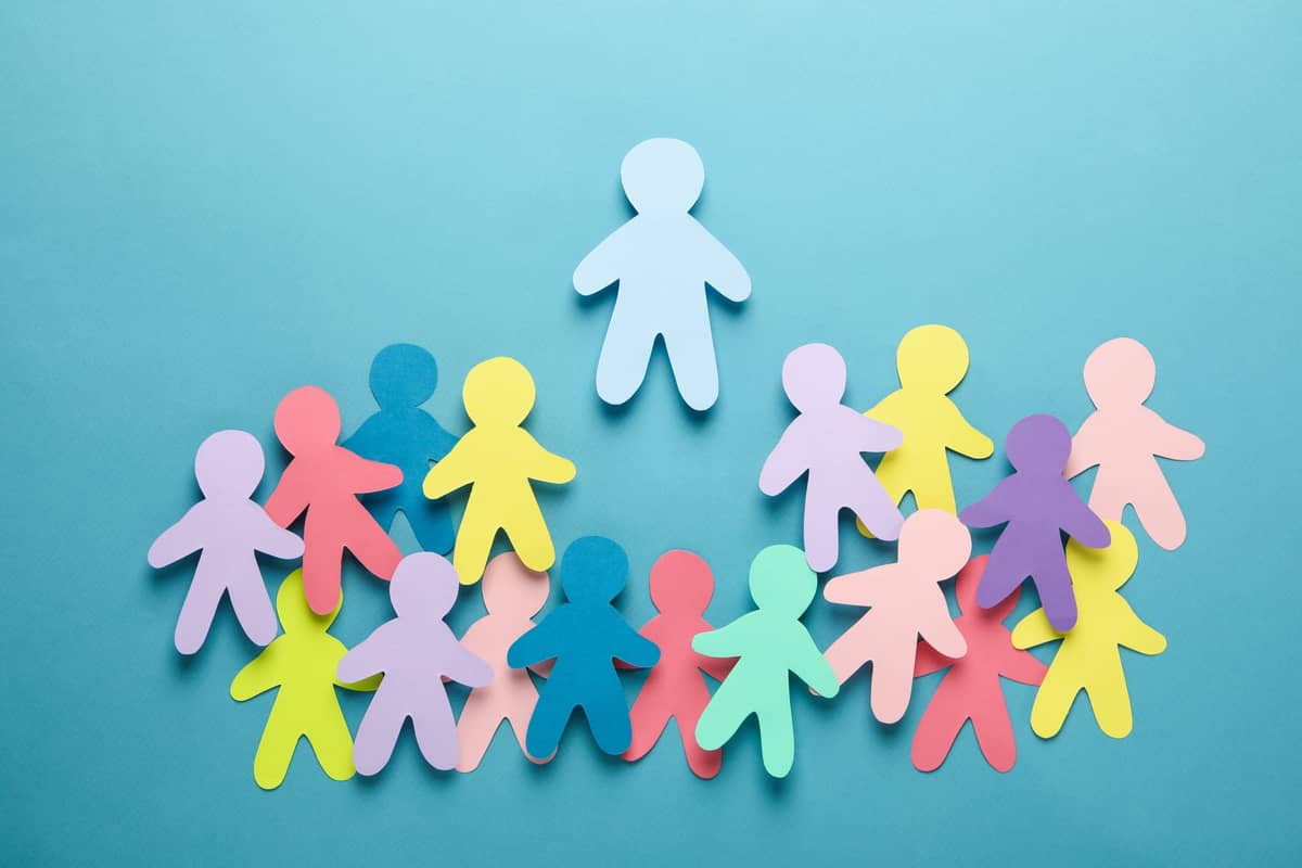 Paper cut outs of people