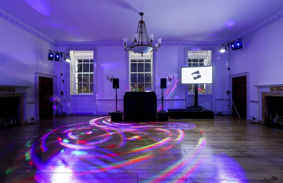 Navy Board Rooms at Somerset House: versatile event space with polished wood floor and AV setup.