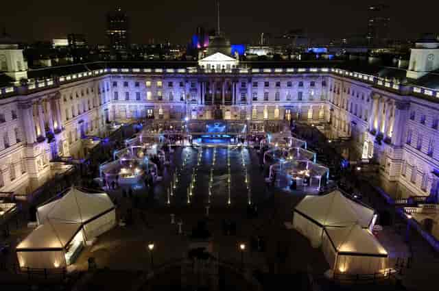 Edmond J. Safra Fountain Court, illuminated venue for upscale receptions and exhibitions.