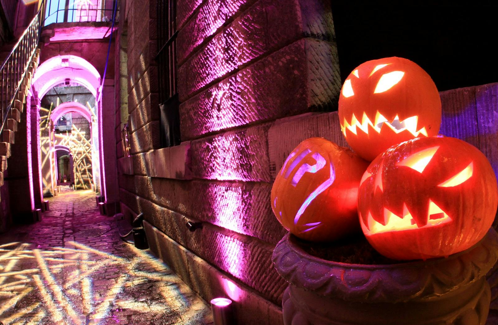 Lightwells and Deadhouse at Somerset House, Halloween pumpkins, festive event venue.