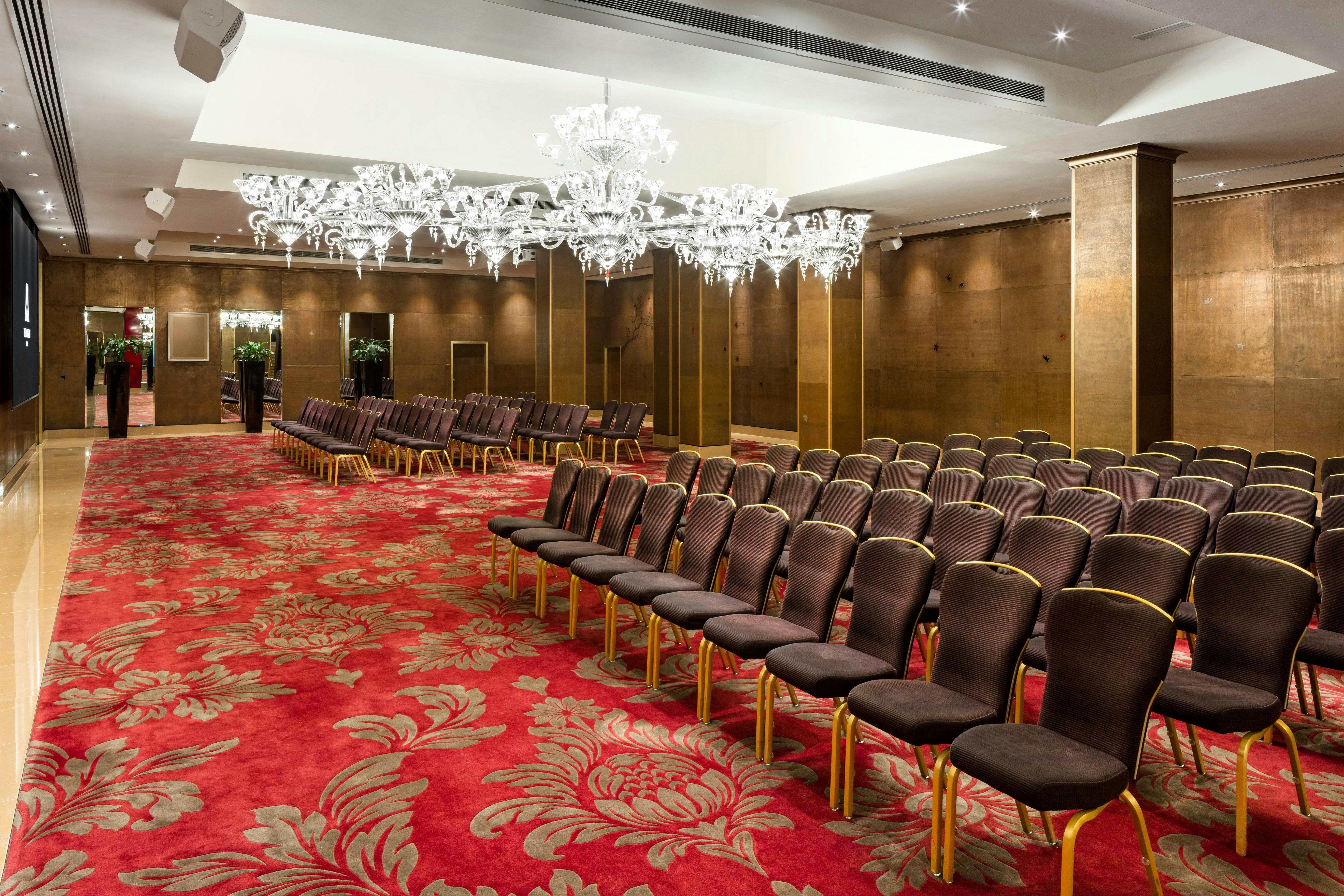 The Crystal Room at The May Fair Hotel, elegant theater-style seating for conferences.