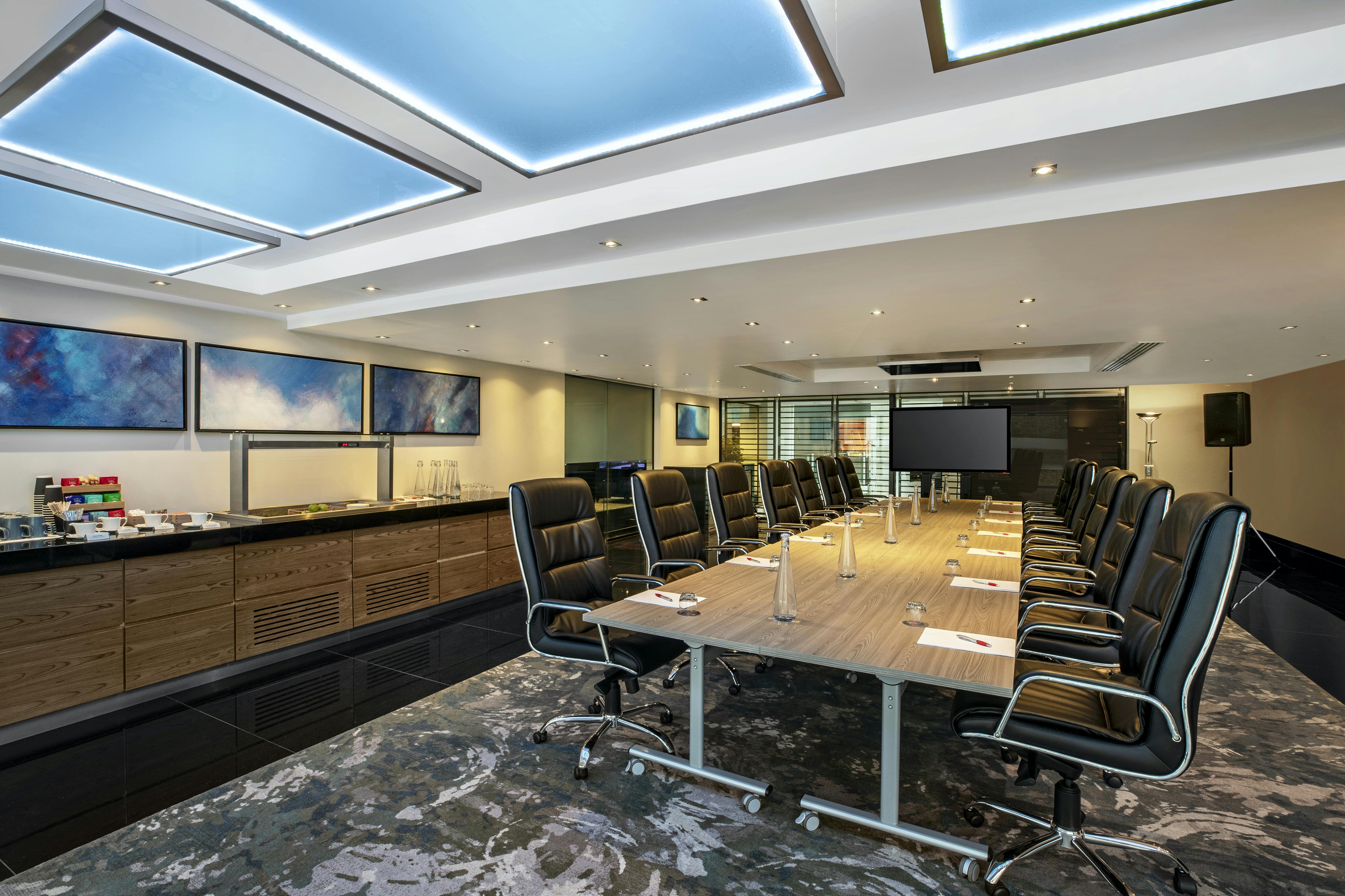 Executive Boardroom at Leonardo Royal Hotel, modern design for corporate meetings.