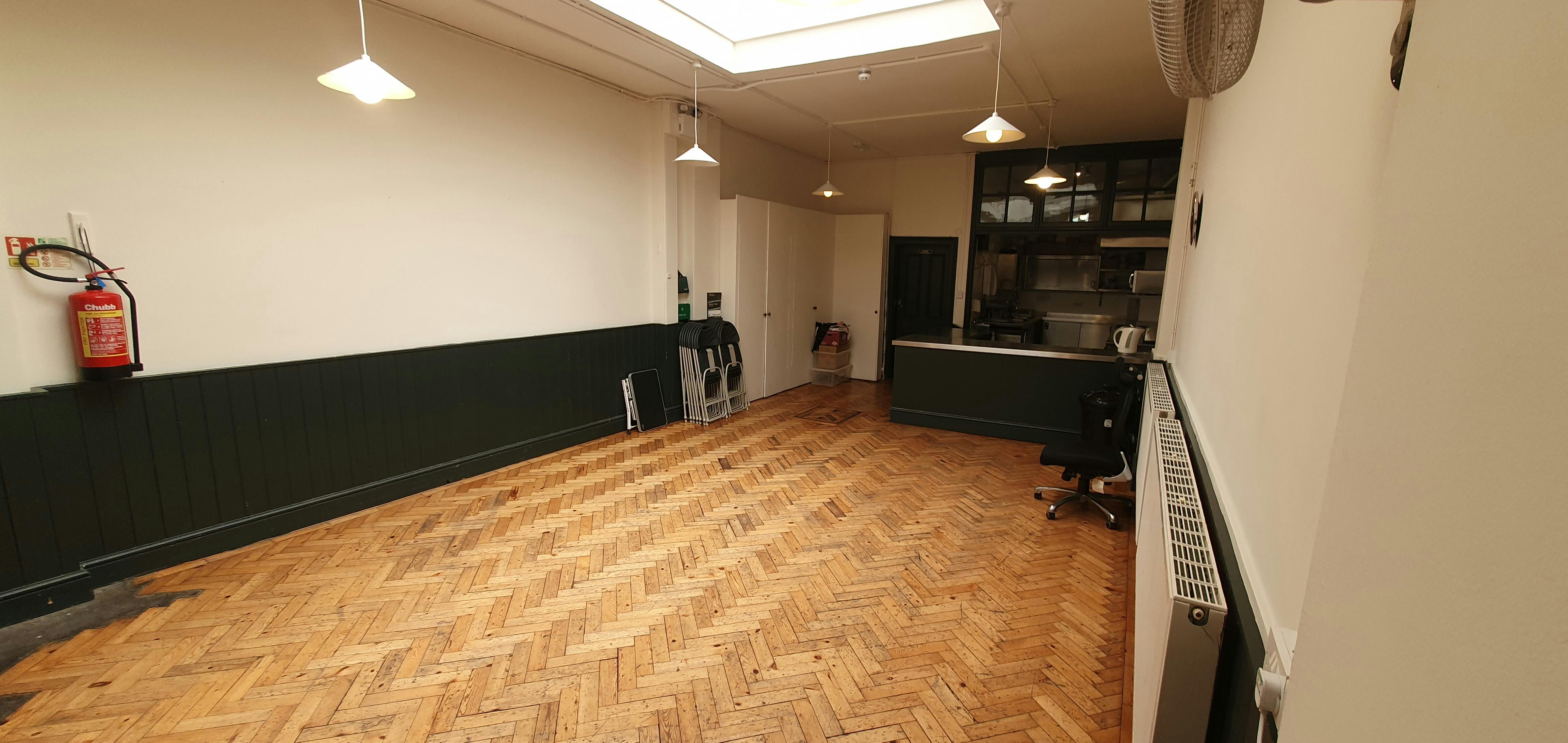 Small Hall in Unity Islington, featuring wooden flooring for versatile meetings and workshops.