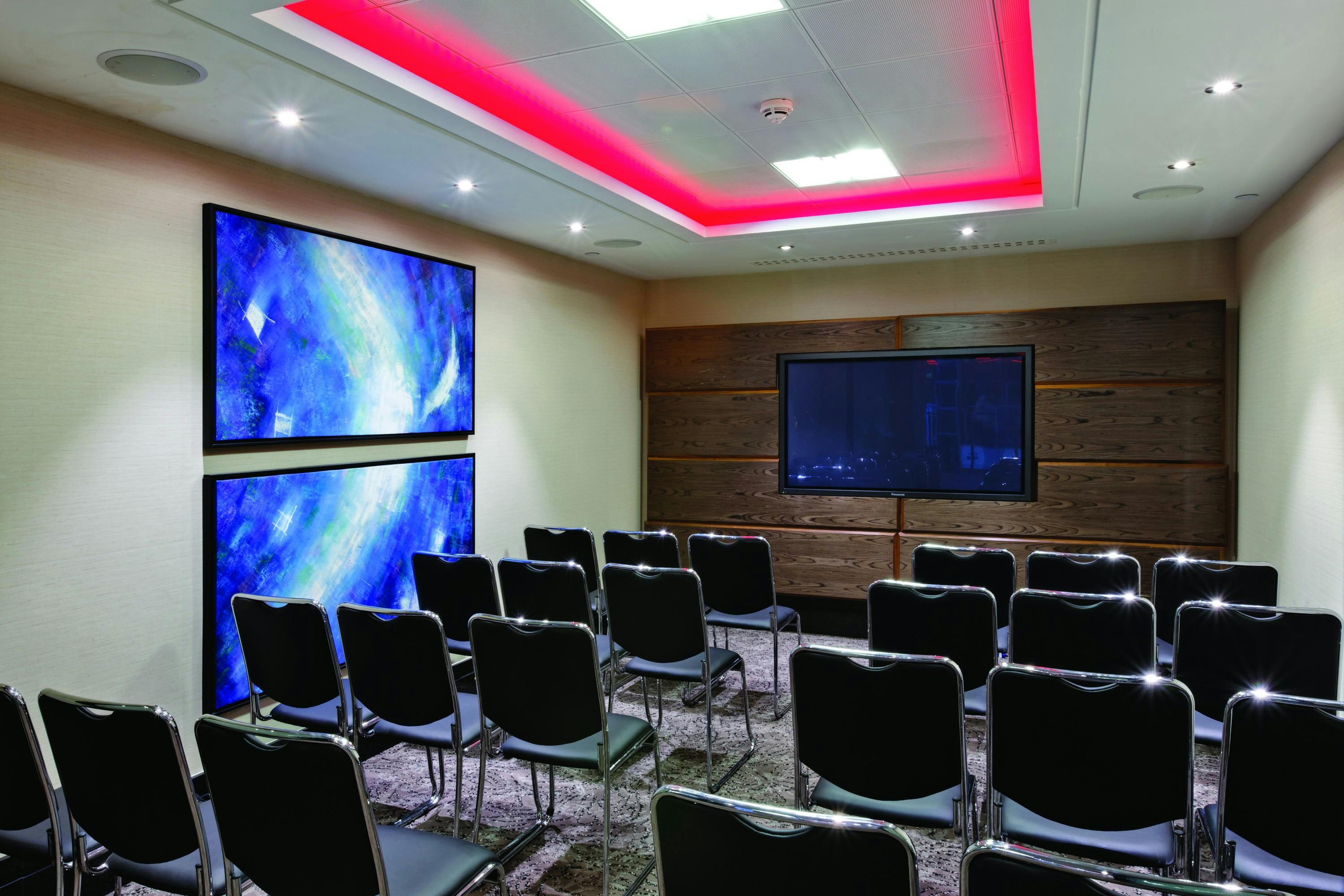 Modern meeting room in Reynolds Suite, Leonardo Royal Hotel, ideal for events and presentations.