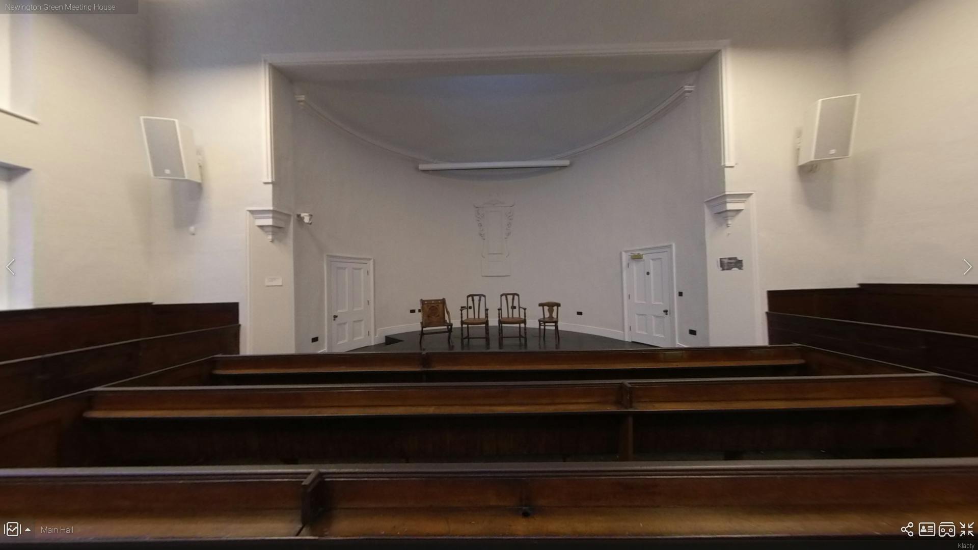 Main Hall in Newington Green Meeting House, minimalist event space for gatherings and discussions.