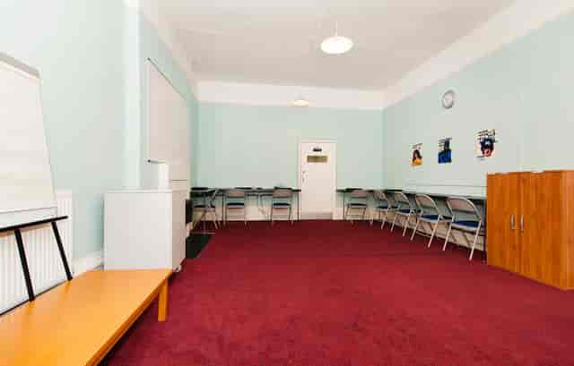 Katherine Low Settlement meeting room for corporate workshops and professional breakout sessions.