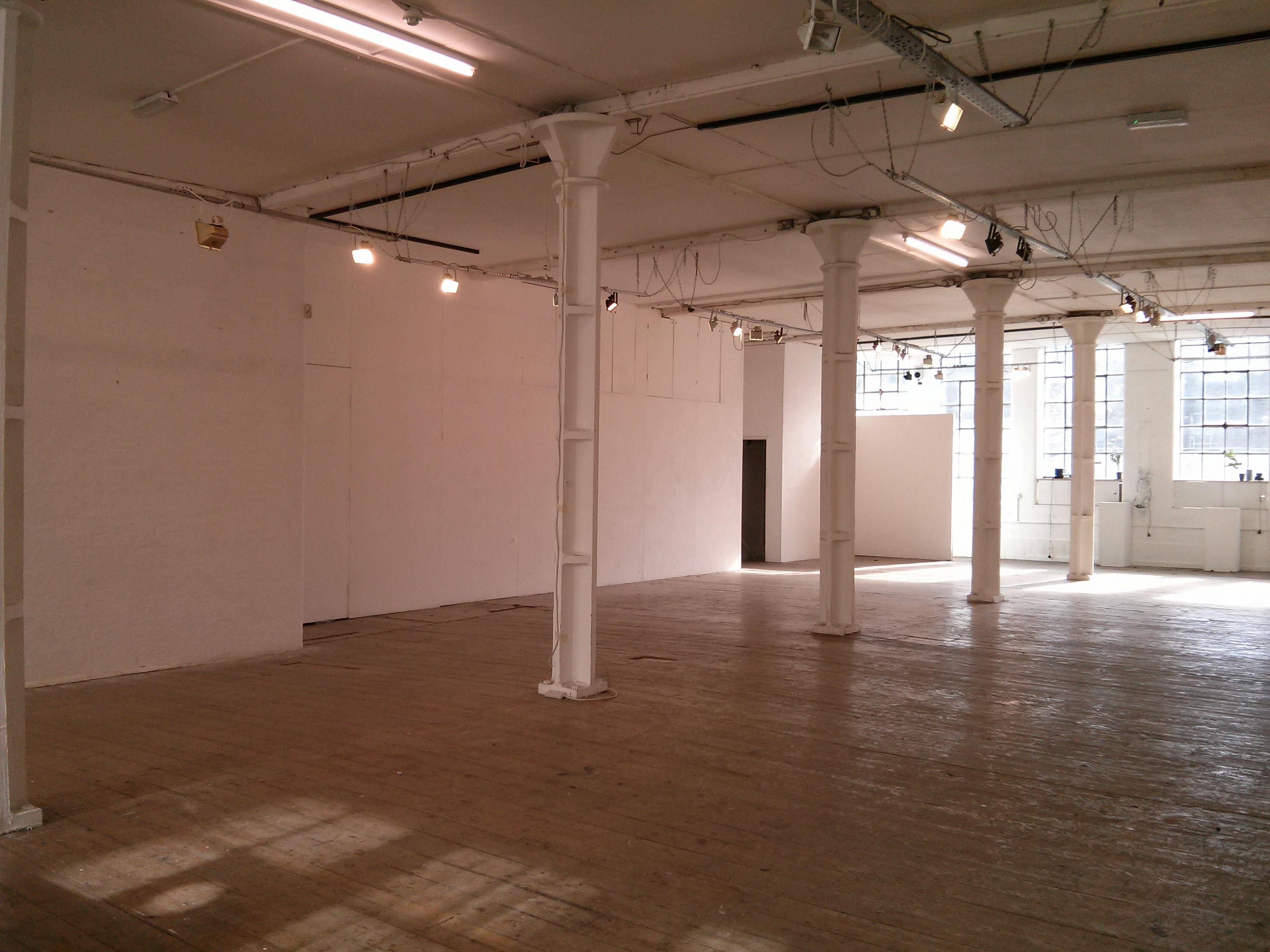 Spacious First Floor Gallery venue with high ceilings for events and meetings.