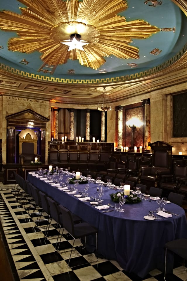 Masonic Temple event space with elegant table setting for corporate gatherings and upscale dinners.