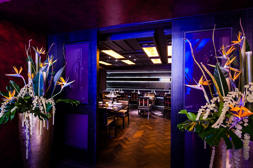 Private Dining Room at Buddha Bar London with vibrant floral decor for upscale events. - Banner