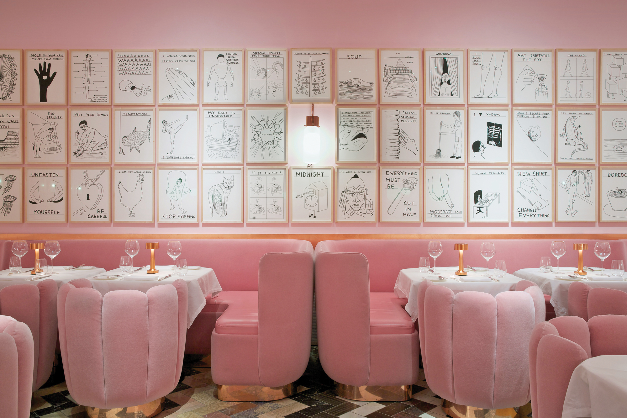 Chic dining space with pink decor, perfect for intimate gatherings and events.