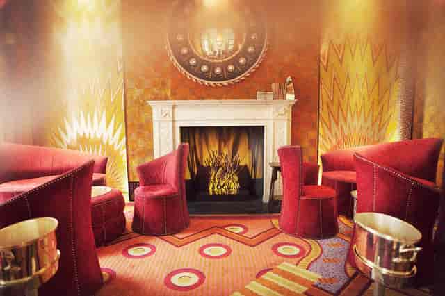 Stylish Lecture Room with plush red seating, perfect for meetings and brainstorming sessions.