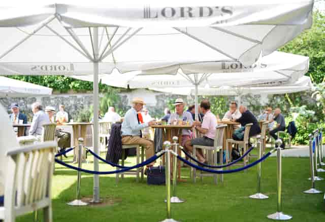 Outdoor networking event at Harris Garden, Lord's Cricket Ground with vibrant greenery.