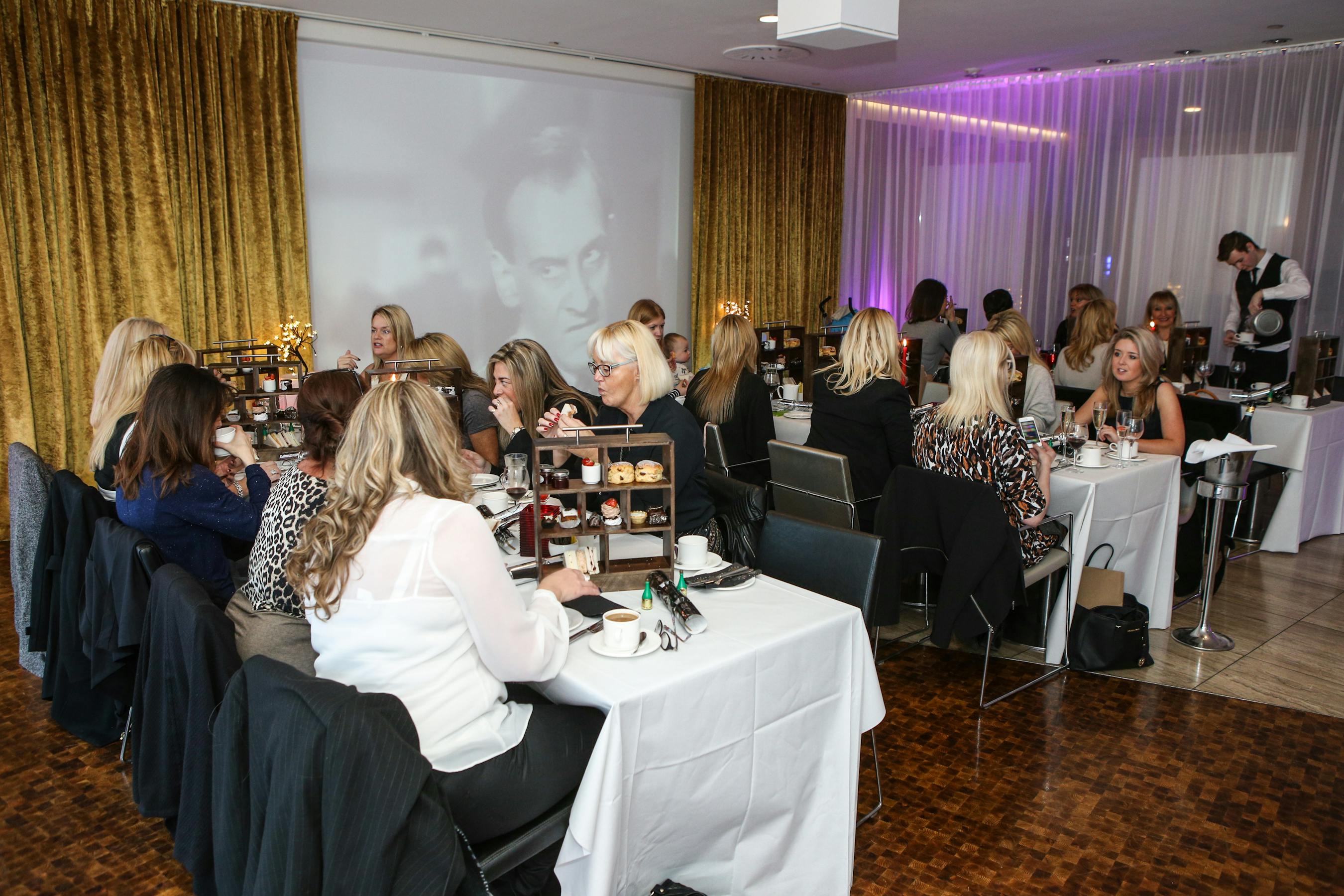 Exchange Restaurant event space in Hilton Liverpool, elegant decor for corporate gatherings.