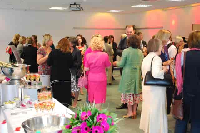 Vibrant networking event at The Ark Conference Centre with engaged attendees and elegant catering.