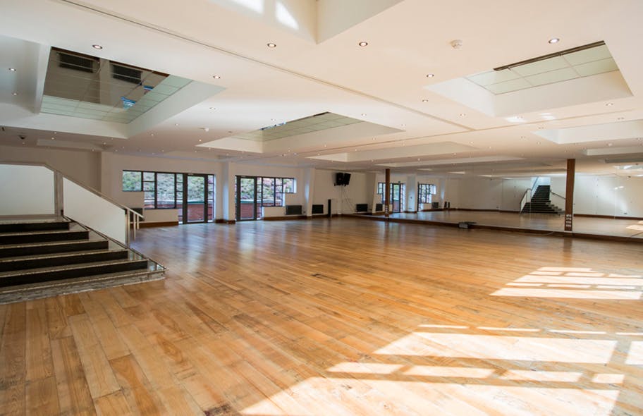 Spacious event space at Leverhulme Hotel with natural light, ideal for workshops and gatherings.