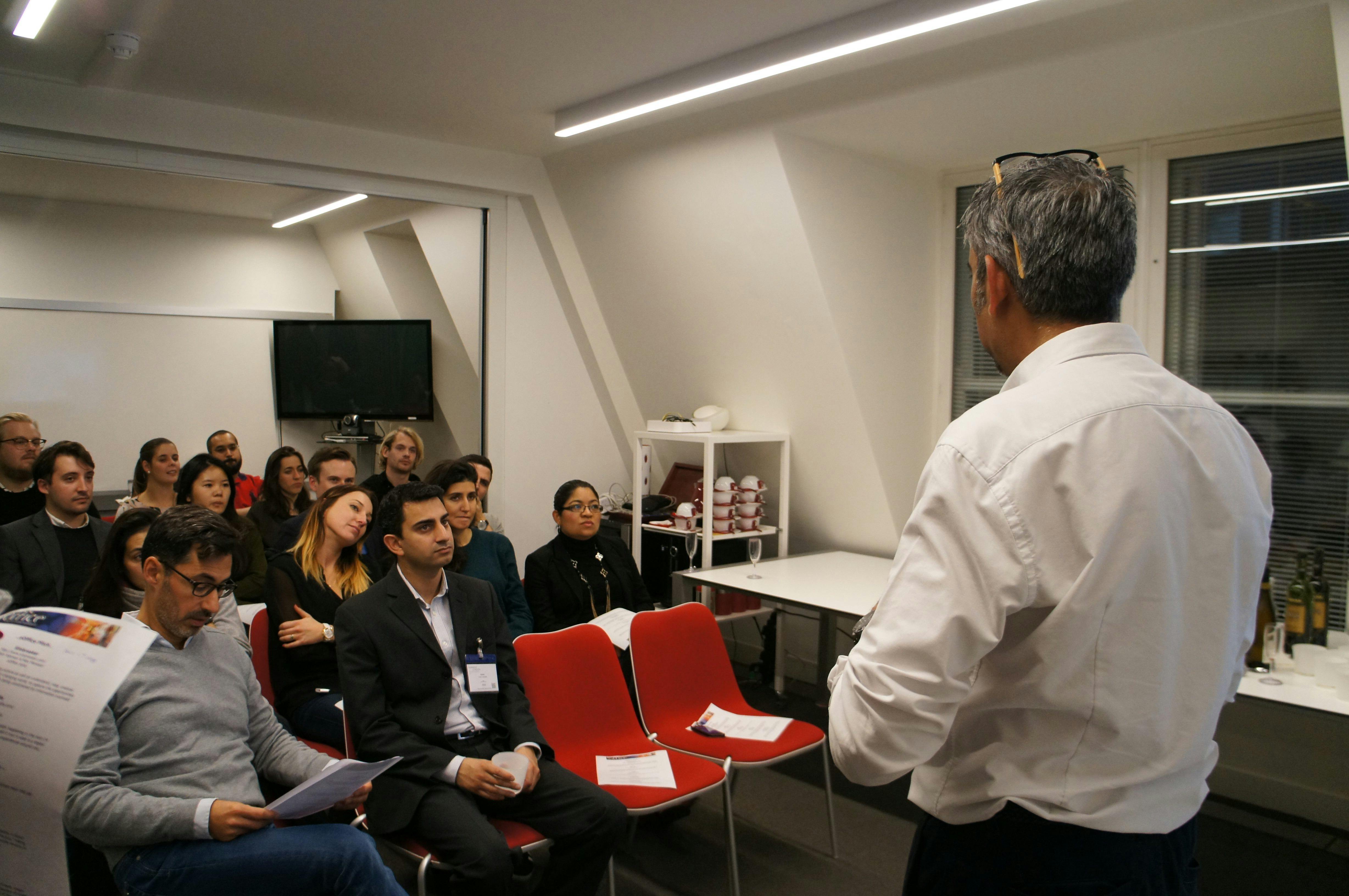 Conference Room in eOffice - Soho with engaged audience at a professional meeting.