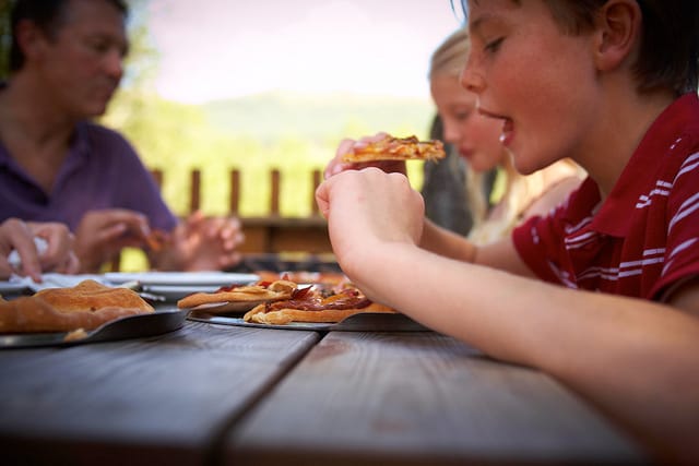 Forest Cabin outdoor dining in Forest of Dean, ideal for team-building and gatherings.