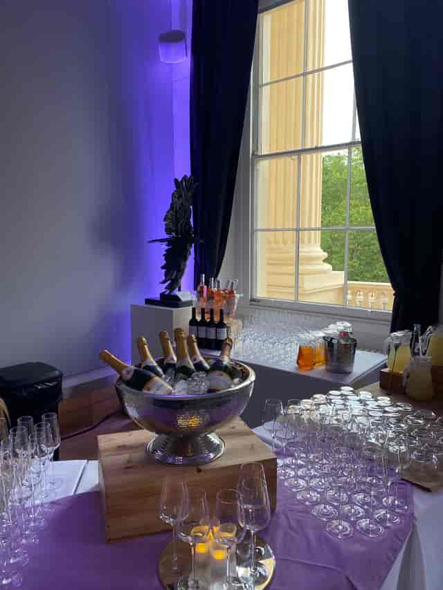 Elegant beverage station with champagne, wines, and cocktails for upscale events.