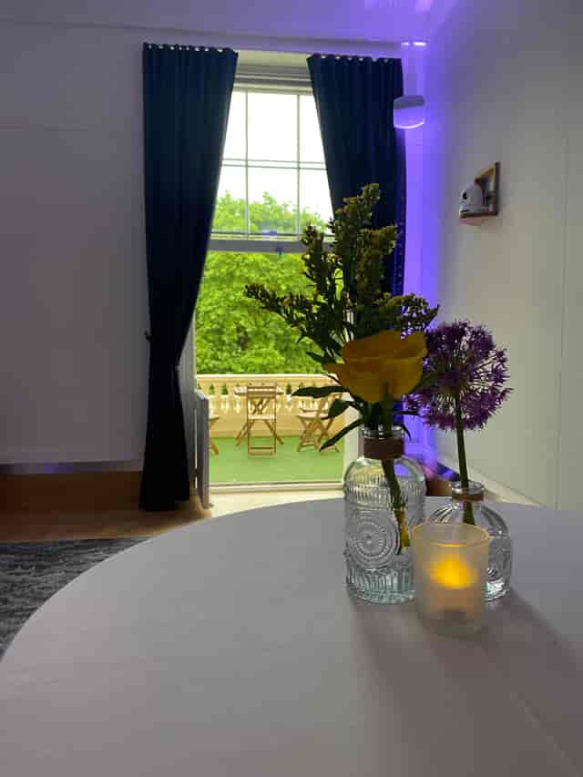 Elegant table setting with flowers at National Grid, perfect for intimate events and networking.