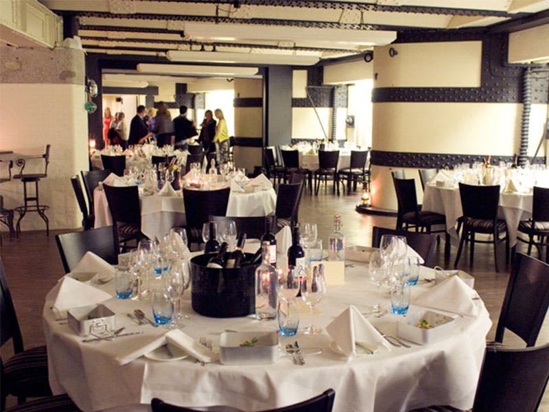 Elegant event space at Cabaret Club, No Man's Fort, ideal for corporate dinners and celebrations.