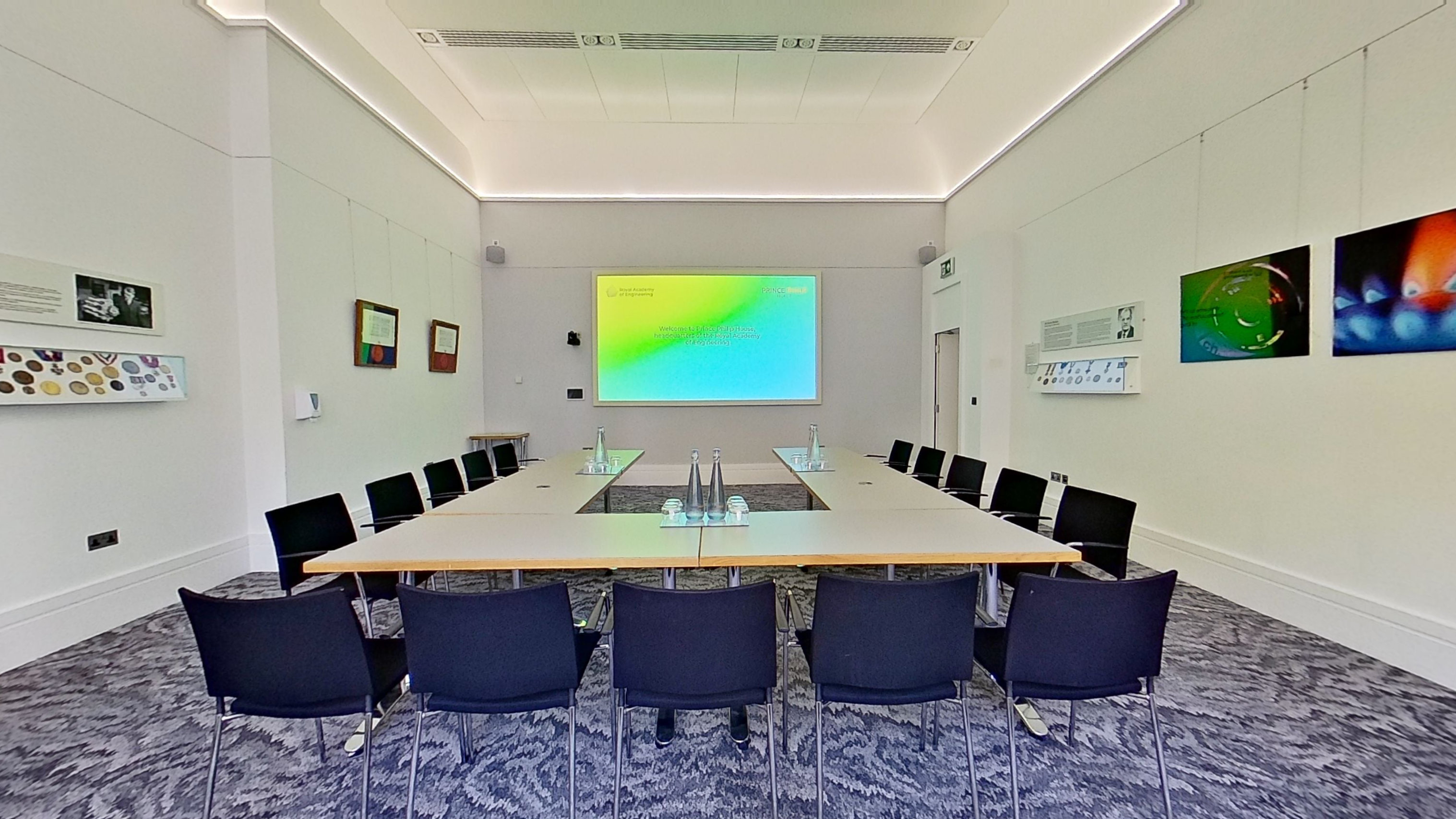 Modern meeting room at Michael Bishop Foundation, ideal for collaboration and presentations. - Banner