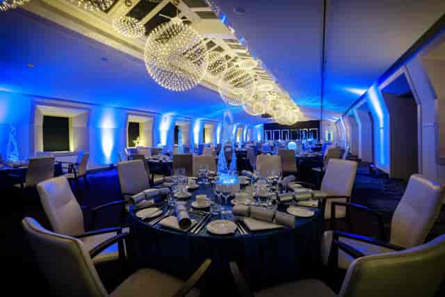 Gala dinner, blue lighting, chandeliers, event