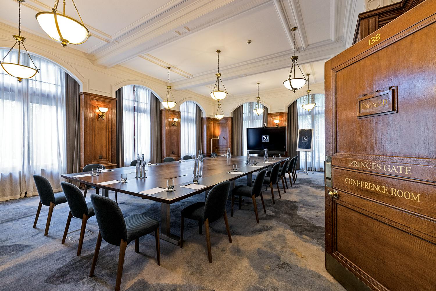 Sophisticated conference room with wood paneling at The Heritage Rooms, Euston Square.