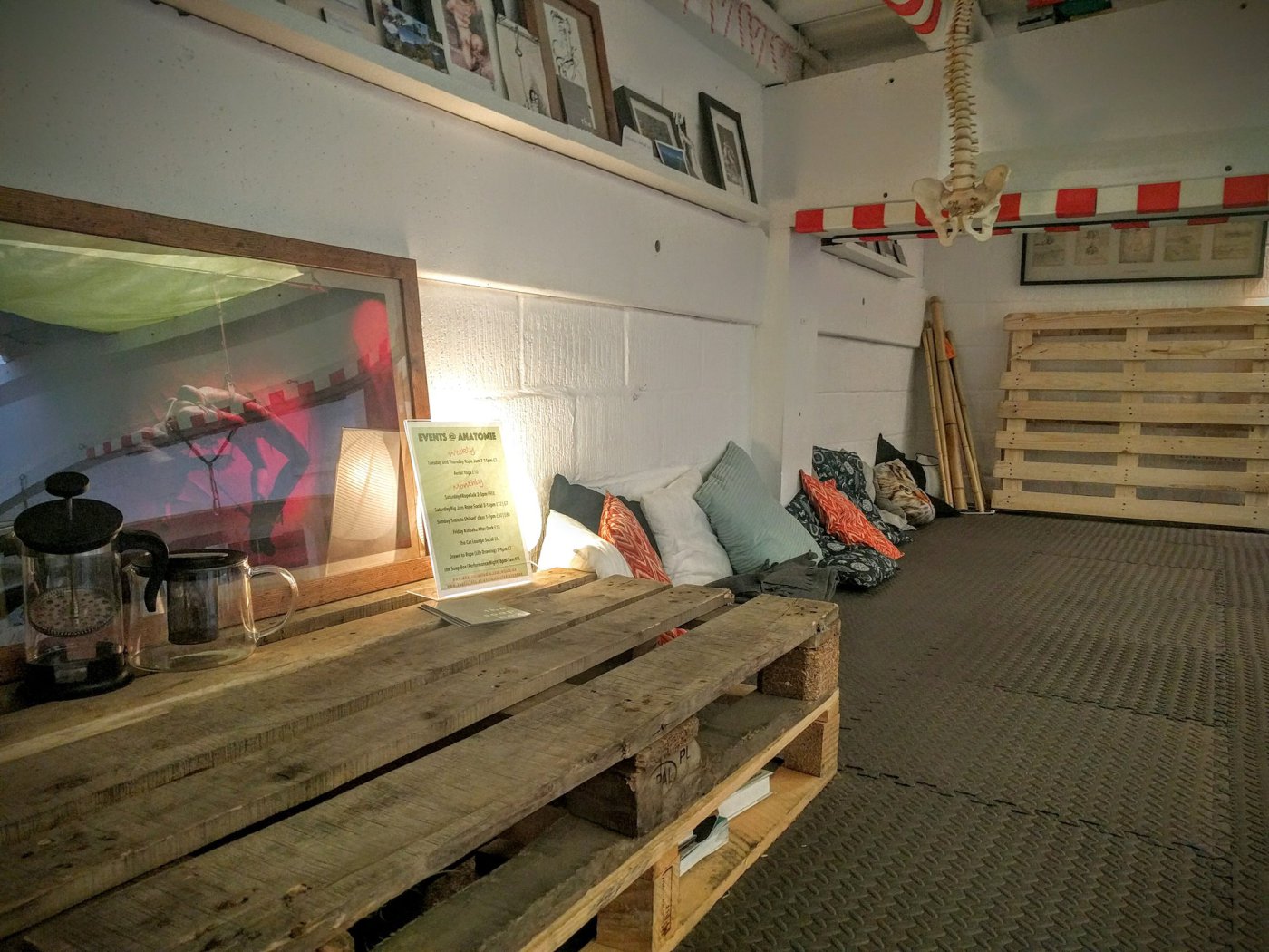 "Relaxed meeting space with pallet seating for creative workshops and collaboration."