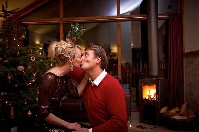 Cozy Forest Cabin with fireplace, perfect for romantic gatherings and holiday parties.