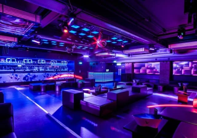 Vibrant cocktail bar in Sway with modern decor for nightlife events and celebrations. - Banner