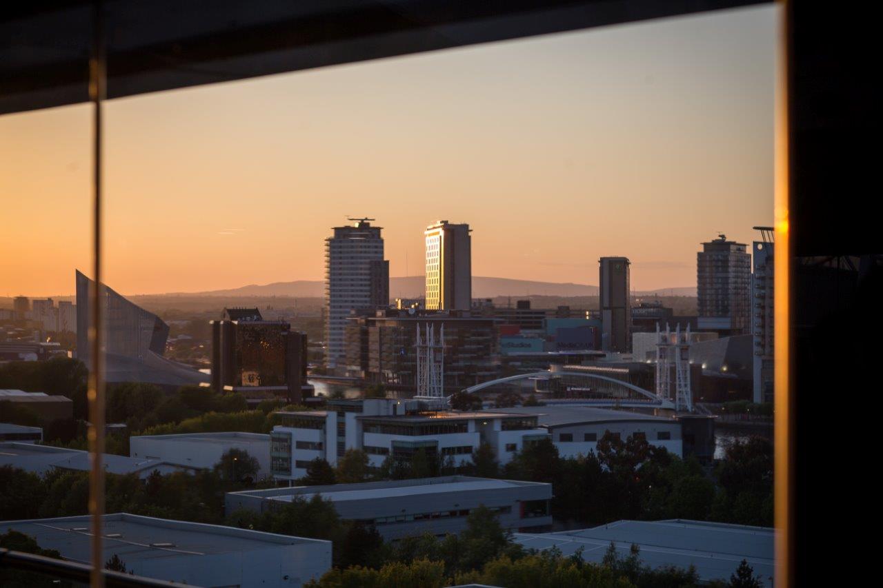 Stunning urban skyline at sunset from Heaven, Hotel Football, ideal for events and receptions. - Banner