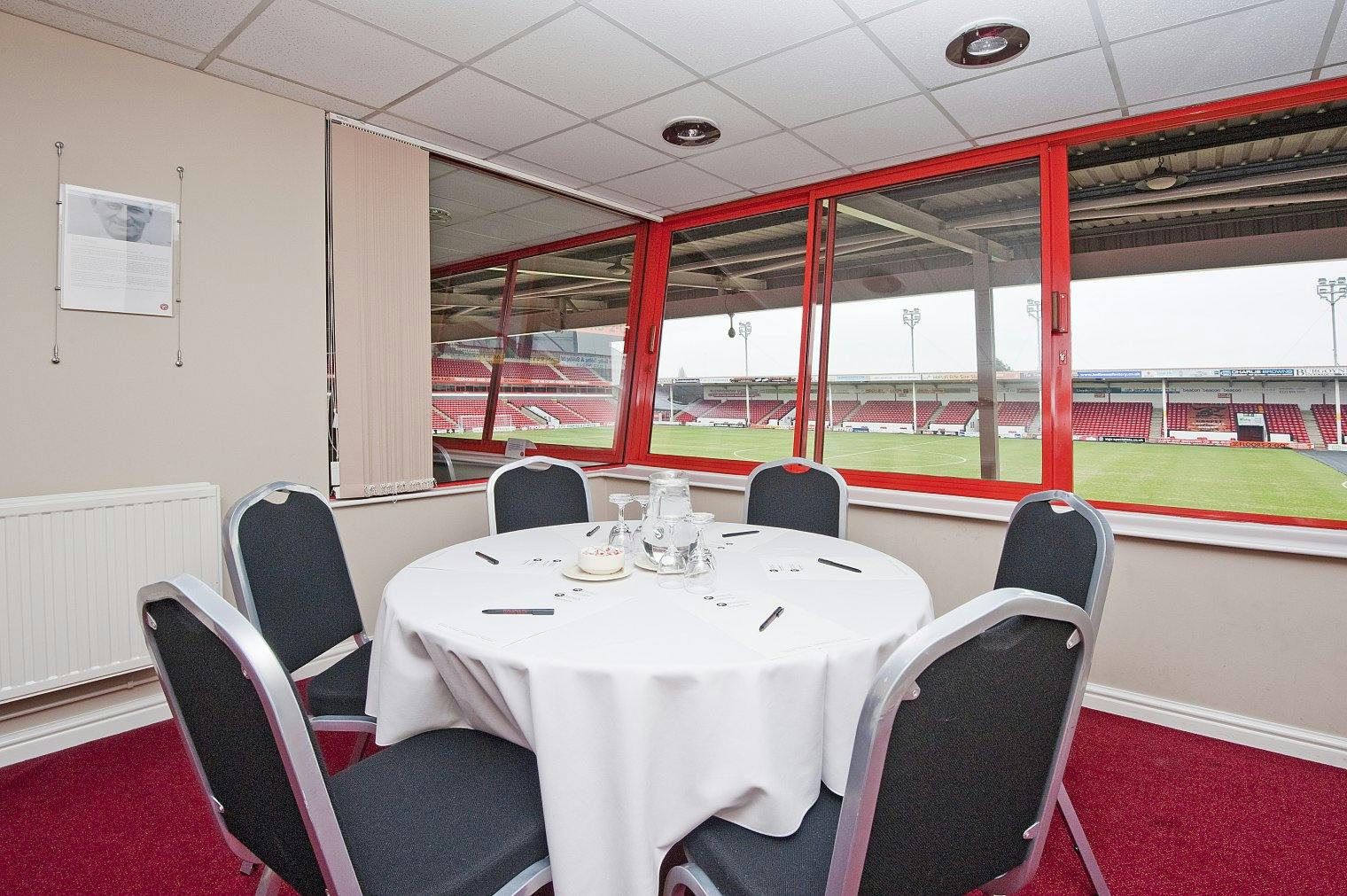 Executive Box at Walsall FC: modern meeting space with stadium view for corporate events.