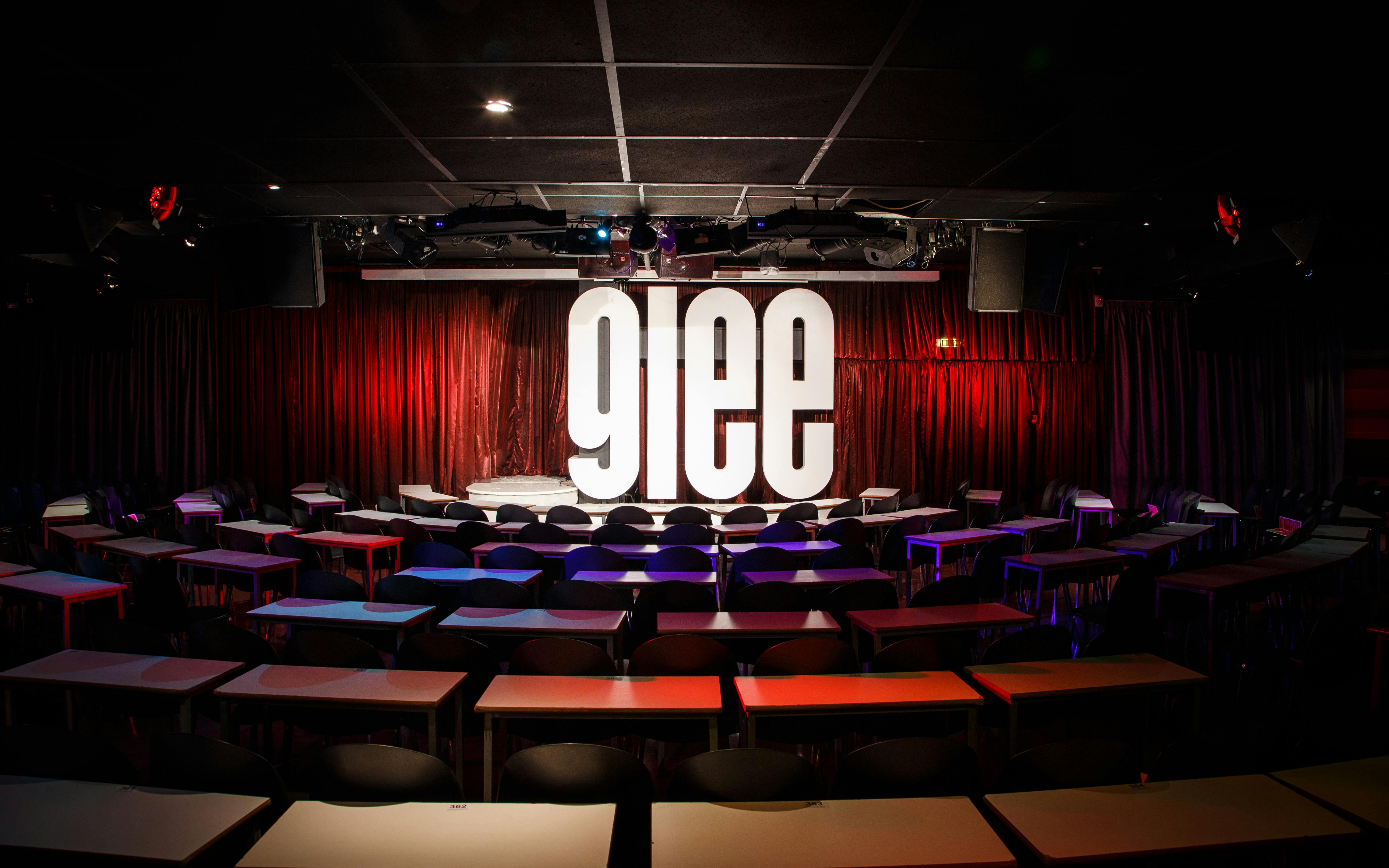 Vibrant Glee Club Birmingham event space with stage, ideal for comedy and live performances.