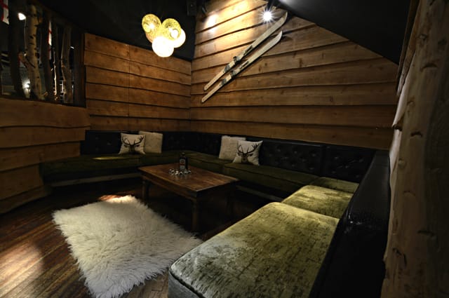 Cozy meeting space with wooden walls for creative brainstorming sessions in St. Paul.