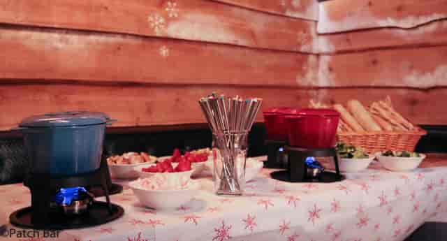 Interactive food station with fondue pots at Lodge in Patch St Paul’s event.
