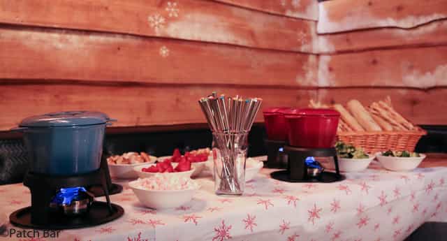 Cozy buffet setup with vibrant dips for social and corporate events.