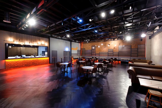 Modern event space at Manchester Arena with flexible seating for gatherings and meetings.