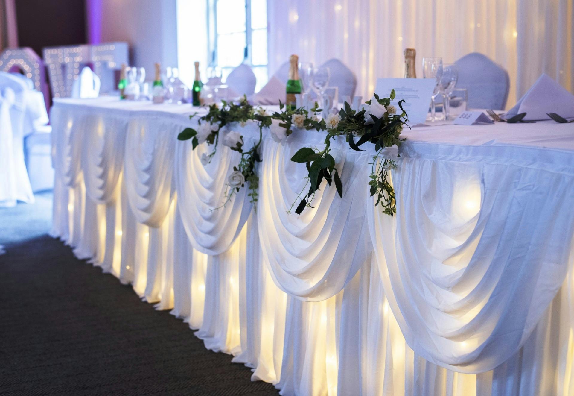 Elegant head table in Best Western Thurrock Hotel for weddings and formal events.