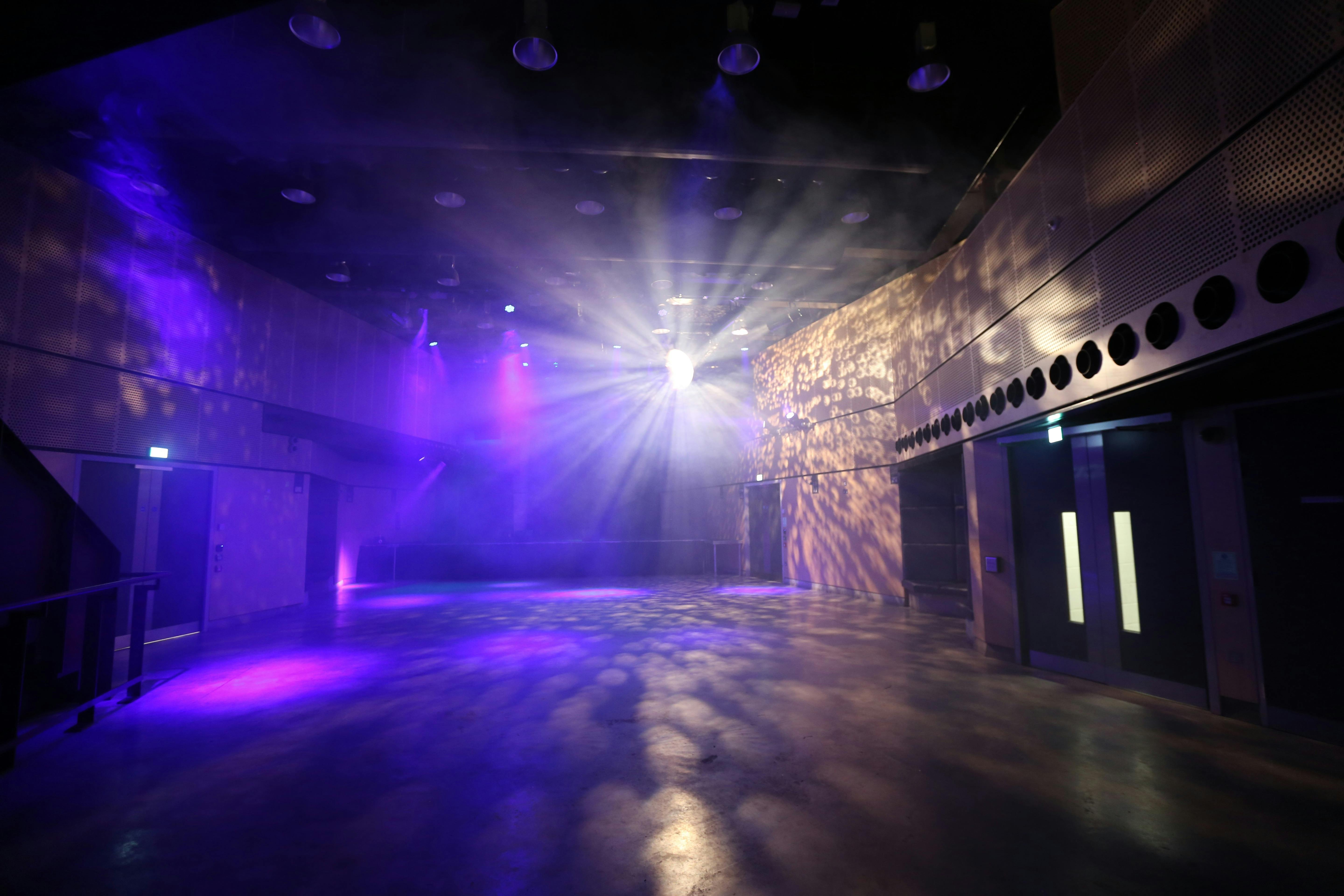 Versatile event space in Saw Swee Hock Centre with dynamic lighting for corporate and social events.