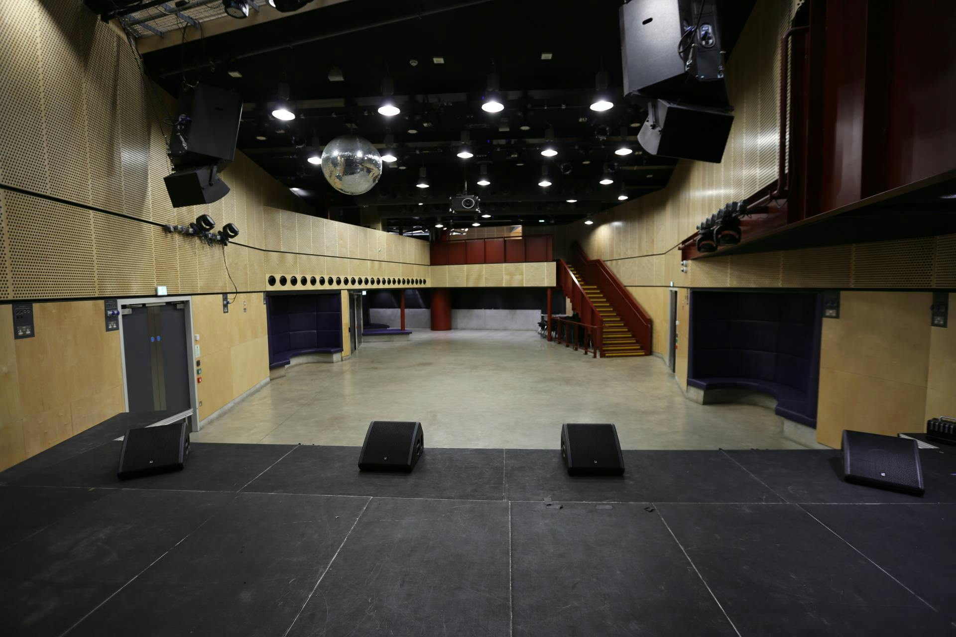 Versatile event space with spacious stage at Saw Swee Hock Centre for conferences and concerts.