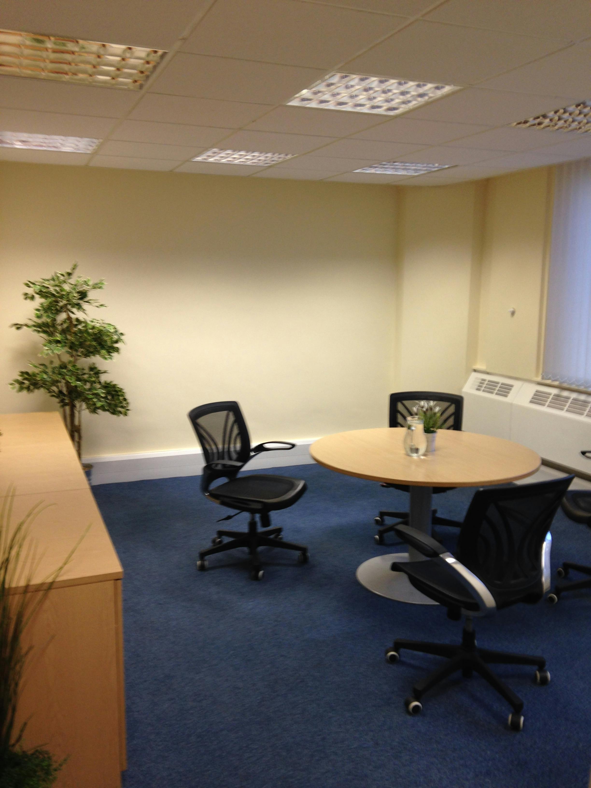 Board Room at Devonshire House: minimalist design for meetings and brainstorming sessions.