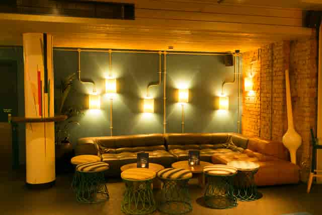 Stylish lounge area in Azulito Bar, ideal for networking events and casual meetings.