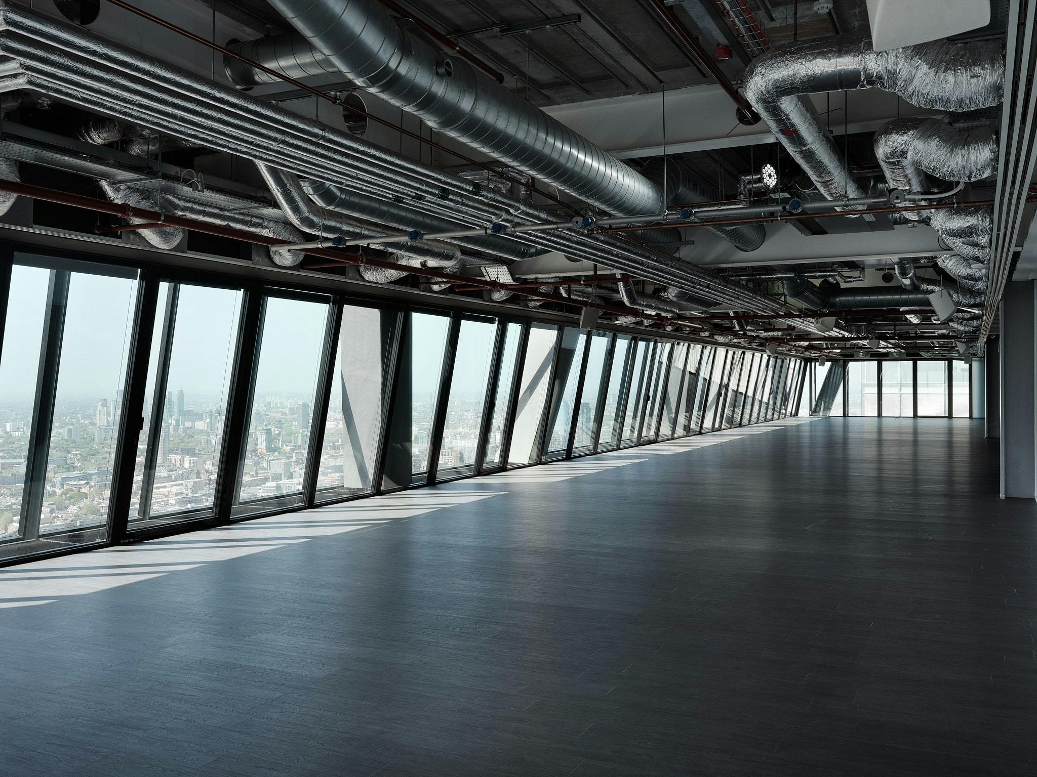 Spacious modern event venue with city views at Leadenhall Building, ideal for corporate gatherings.