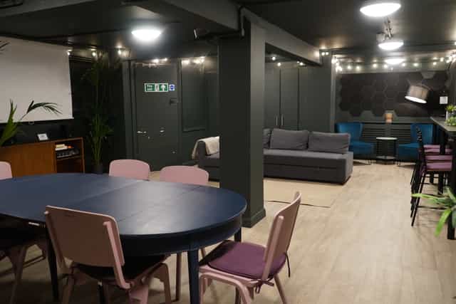 Versatile event space at Young Actors Theatre Islington with round table setup for meetings.