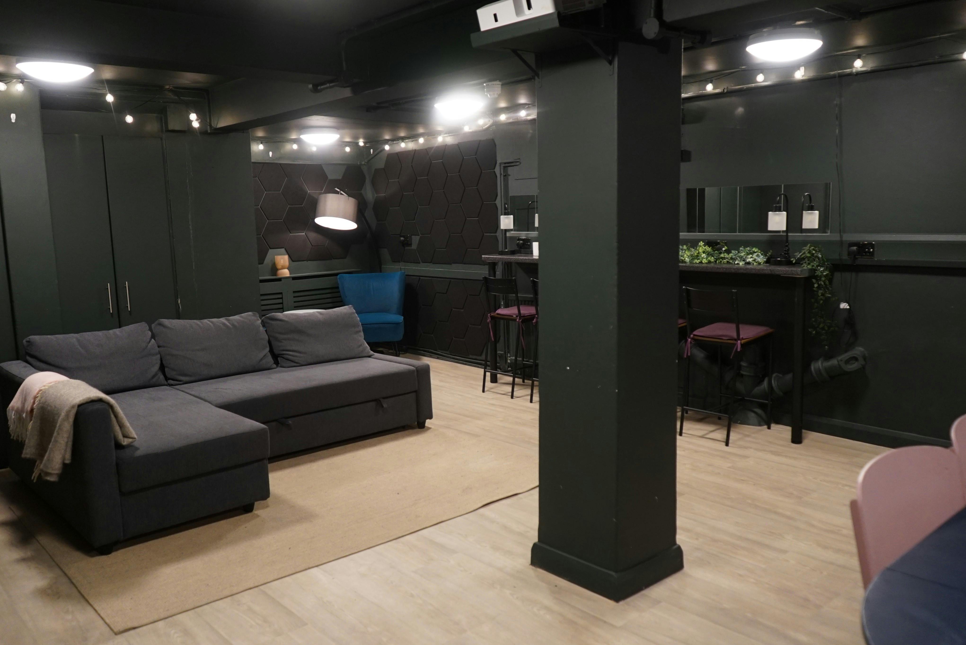 Versatile basement event space with cozy seating for gatherings at Young Actors Theatre Islington.