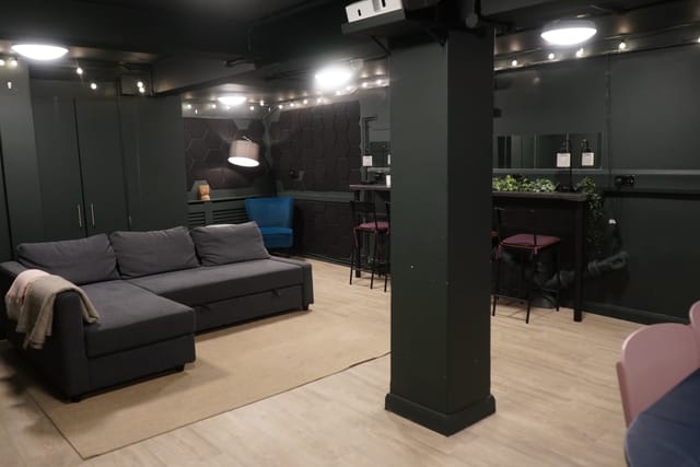 Versatile meeting space with cozy seating at Young Actors Theatre Islington for networking events.