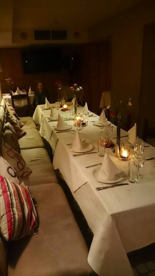 Elegant dining table in Retsina Private Room for intimate dinners and special events.